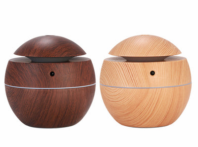Dark wood grain aroma diffuser and humidifier with a silver power button and accent line. - Image 3