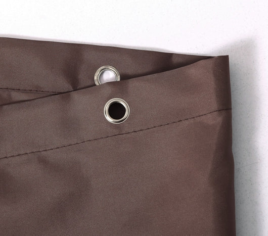 Solid brown polyester shower curtain with metal grommets and hooks, hanging from a silver shower rod. - Image 12