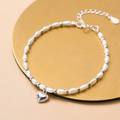 Pulsera de Perlas con Dije de Amor - Elegancia y Serenidad - Image 7