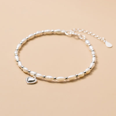 Pulsera de Perlas con Dije de Amor - Elegancia y Serenidad - Image 8