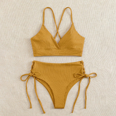Light green ribbed bikini set with a V-neck bralette top and high-waisted bottoms featuring side tie details. - Image 4