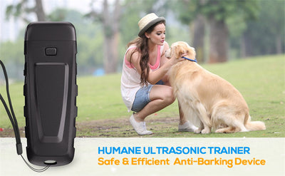 Black and orange handheld ultrasonic dog training device with a Type-C charging port and an orange button. - Image 9