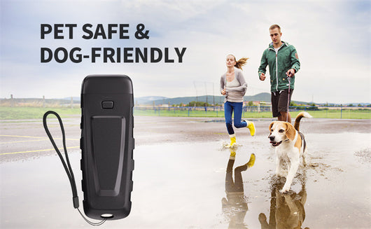Black and orange handheld ultrasonic dog training device with a Type-C charging port and an orange button. - Image 11
