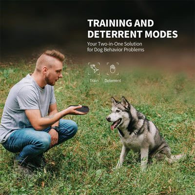 Black and orange handheld ultrasonic dog training device with a Type-C charging port and an orange button. - Image 17