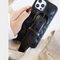 Funda de Cuero para iPhone Mujer con Pulsera - Edición Limitada Lujo Negro