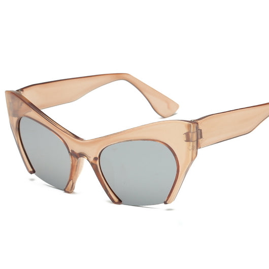 Red cat-eye sunglasses with silver mirrored lenses, featuring a bold retro frame design. - Image 5