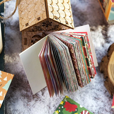 100 mini retro Christmas paper notes featuring vintage illustrations of Santa, snowmen, and holiday scenes. - Image 25