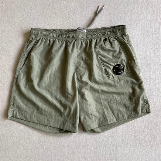 Pantalones Cortos Deportivos Sueltos de Nylon para Playa - Estilo Juvenil Verano - Image 20