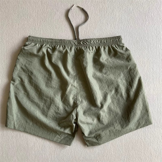 Pantalones Cortos Deportivos Sueltos de Nylon para Playa - Estilo Juvenil Verano - Image 22