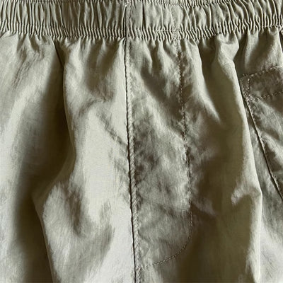 Pantalones Cortos Deportivos Sueltos de Nylon para Playa - Estilo Juvenil Verano - Image 38