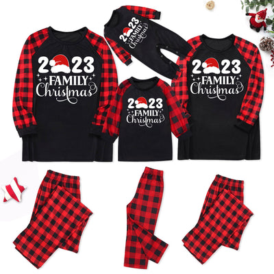 Red and black buffalo plaid Christmas pajama set with a long-sleeve top and matching pants. Top reads "2023 FAMILY Christmas". - Image 26
