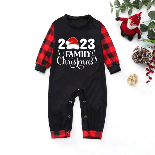 Red and black buffalo plaid Christmas pajama set with a long-sleeve top and matching pants. Top reads "2023 FAMILY Christmas". - Image 29