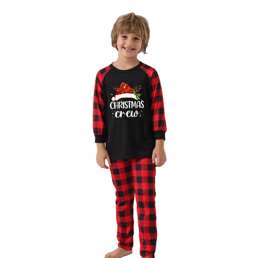 Kids' Christmas pajama set with a black "Christmas Crew" top and red and black buffalo plaid pants. - Image 18