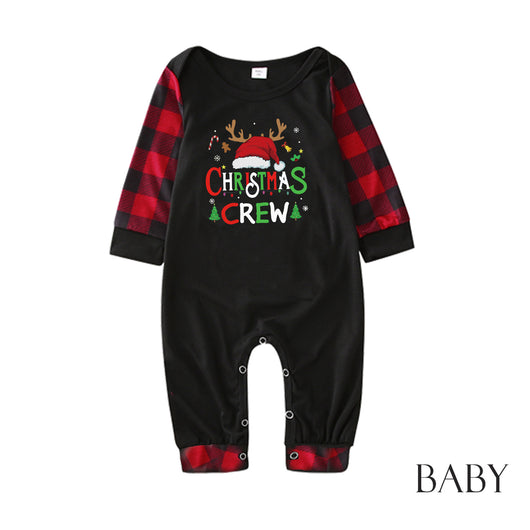 Man wearing a Christmas pajama set with a black long-sleeve top and red and black buffalo plaid pants. - Image 34