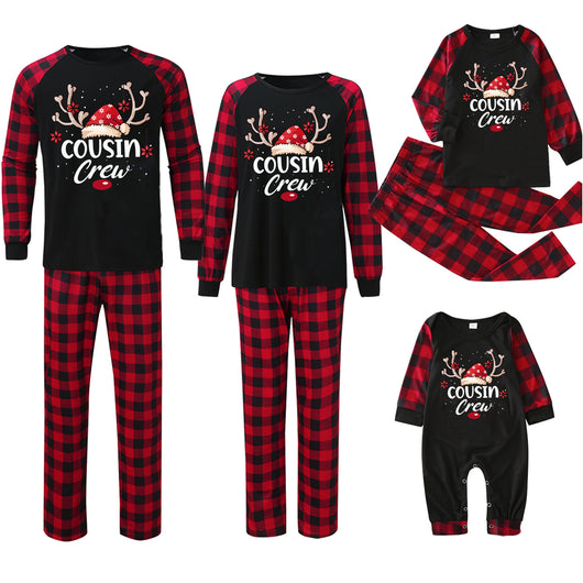 Kids' black and red buffalo plaid Christmas pajamas with 'Cousin Crew' graphic and reindeer antlers. - Image 20