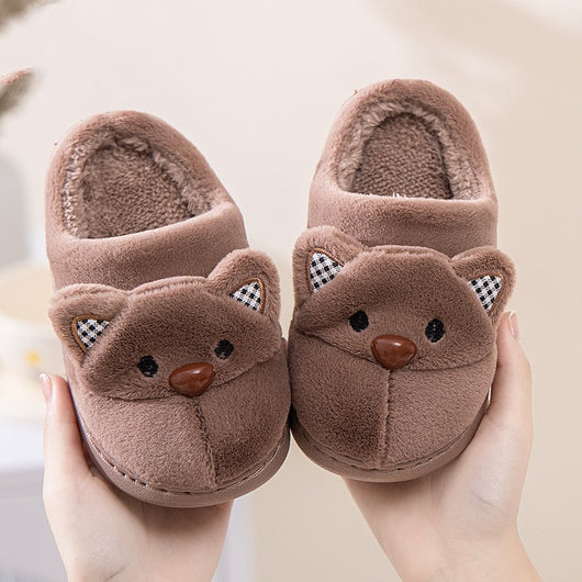 Pair of gray plush bear slippers with checkered ears and brown noses, held up against a soft background. - Image 7