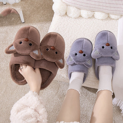 Pair of gray plush bear slippers with checkered ears and brown noses, held up against a soft background. - Image 9