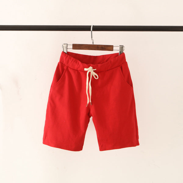 Pantalones deportivos de cintura media en color sólido