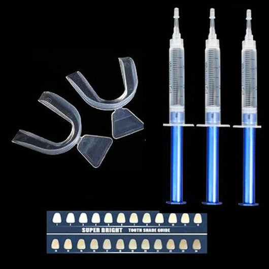Teeth whitening kit with a blue LED light mouthpiece and a syringe of whitening gel on a white background. - Image 9