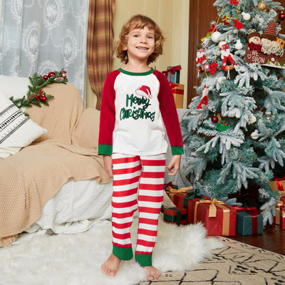 Matching family Christmas pajamas with red and white stripes, green trim, and "Merry Christmas" text with a Santa hat. - Image 11