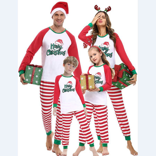 Matching family Christmas pajamas with red and white stripes, green trim, and "Merry Christmas" text with a Santa hat. - Image 13