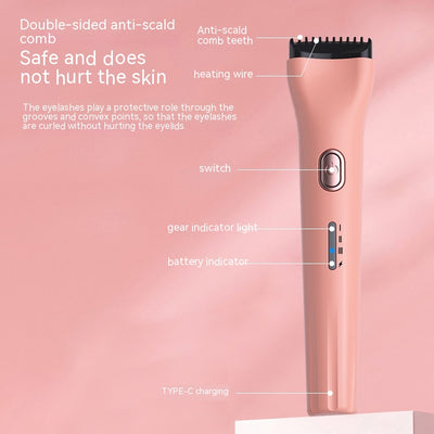 White portable heated eyelash curler with a rose gold power button and blue indicator light. - Image 9
