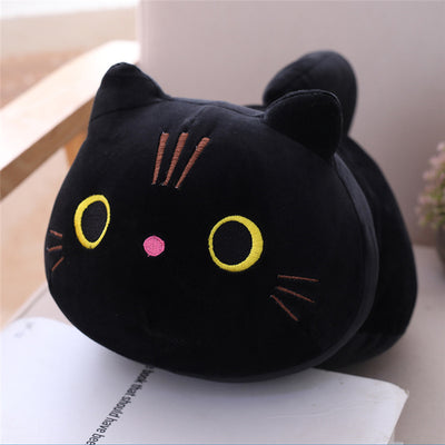 Cute orange cat plush doll with pink ears, black eyes, and embroidered whiskers, resting on a white book. - Image 17
