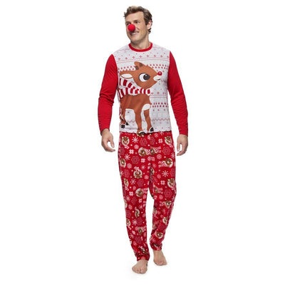 Family of five wearing matching red and white Christmas pajamas with reindeer and snowflake patterns. - Image 9