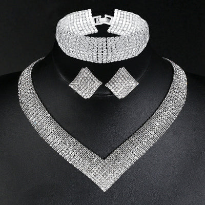 Conjunto de Aretes, Collar y Pulsera con Cristales Brillantes