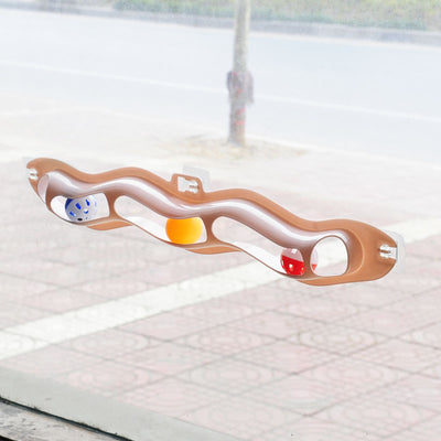 Light blue wavy pet track toy with red, yellow, and blue balls, shown with its packaging featuring two kittens. - Image 12
