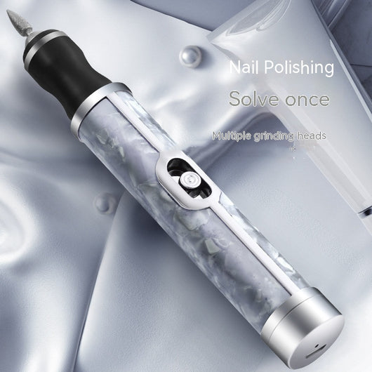 Silver-gray portable nail polishing instrument with a sleek, pen-like design and textured body. - Image 7
