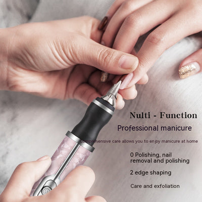 Silver-gray portable nail polishing instrument with a sleek, pen-like design and textured body. - Image 10