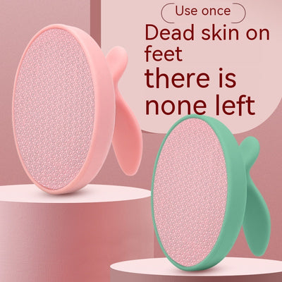 Pink oval nano foot grinder with a textured surface and ergonomic handle, designed for exfoliating and removing calluses. - Image 11