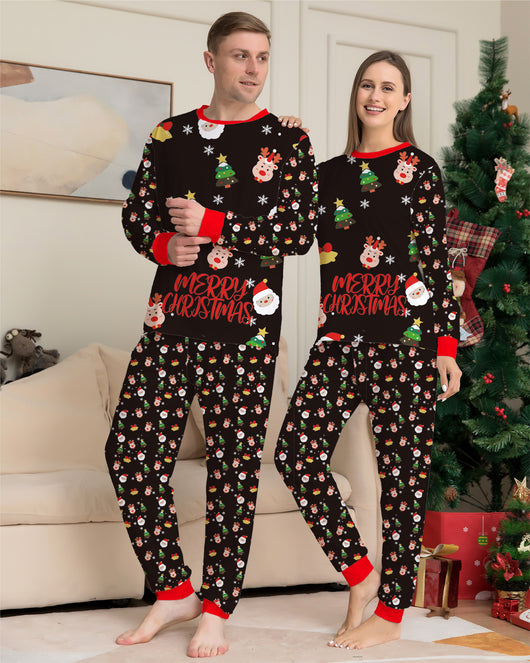 Man wearing a black long-sleeve Christmas pajama set with Santa, reindeer, and Christmas tree patterns. - Image 12