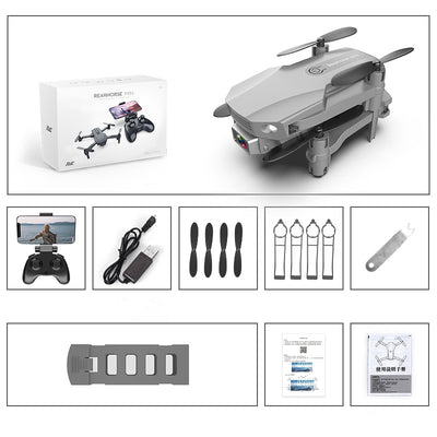 Gray folding drone with 4K camera, remote control, spare propellers, propeller guards, charging cable, and battery. - Image 27