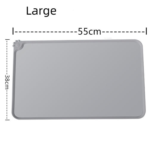 Blue rectangular silicone pet placemat with a raised edge and a small paw print detail in the corner. - Image 15