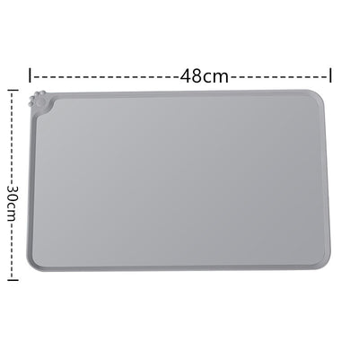 Blue rectangular silicone pet placemat with a raised edge and a small paw print detail in the corner. - Image 16