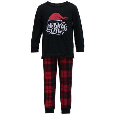 Family of four wearing matching red and black plaid Christmas pajamas with "Christmas CREW" graphic, children in Santa hats. - Image 11