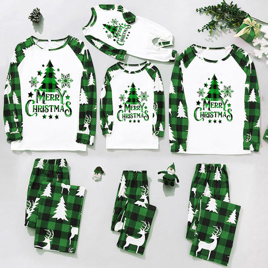 Matching family Christmas pajamas in green and white plaid with deer and Christmas tree graphics. - Image 14