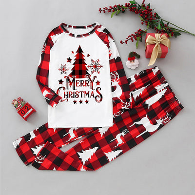 Matching family Christmas pajamas in green and white plaid with deer and Christmas tree graphics. - Image 24