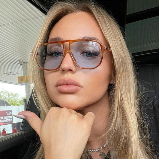 Black frame retro double beam sunglasses with bright orange lenses, featuring silver accents on the temples. - Image 13