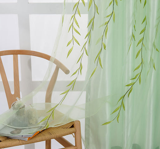 Light green sheer curtains with a delicate willow leaf print, hung on a window rod in a bright room. - Image 4