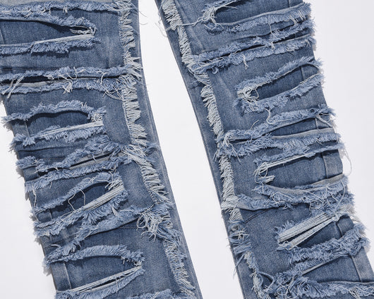 Jeans Azul Rotos con Parches y Detalles Desgarrados - Image 8