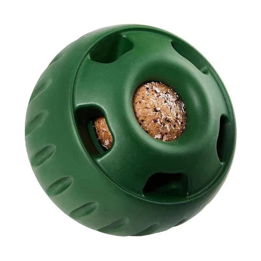 Green silicone dog treat dispensing toy ball next to a yellow silicone mold with three filled compartments. - Image 9