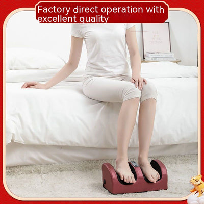 Person using a red and black electric foot massager with four control buttons for power, rotation, intensity, and heat. - Image 10