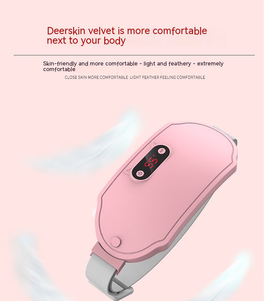 Pink stomach warming belt with vibration and heating, USB charging cable, two wormwood bags, and manual in a floral gift box. - Image 18