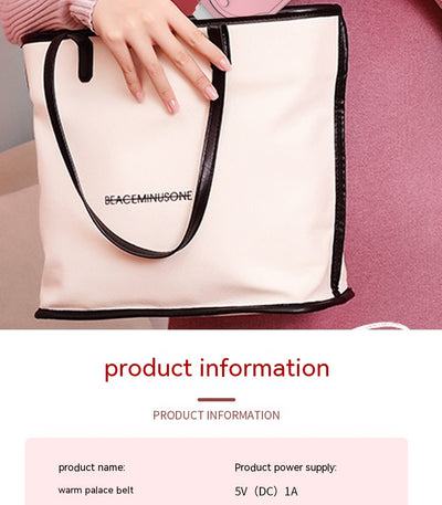Pink stomach warming belt with vibration and heating, USB charging cable, two wormwood bags, and manual in a floral gift box. - Image 21