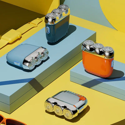 Orange mini electric shaver with three silver floating cutter heads, a blue power button, on a translucent orange block. - Image 11