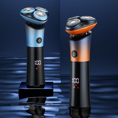 Rechargeable electric shaver with 3D floating head, black to blue-orange gradient, LED display, shown with charging cable, cleaning brush, and blade cover. - Image 13