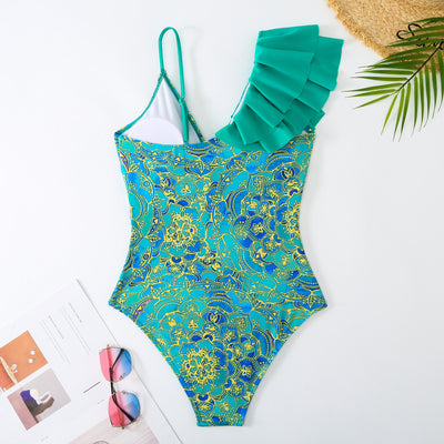 Women's one-shoulder ruffled swimsuit and matching sarong with blue and yellow lemon tile print. - Image 21